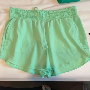 Under Armor womens large neon green athletic shorts